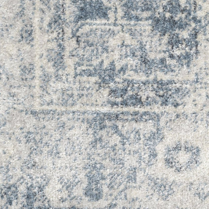 9' X 12' Blue and Ivory Oriental Power Loom Distressed Area Rug