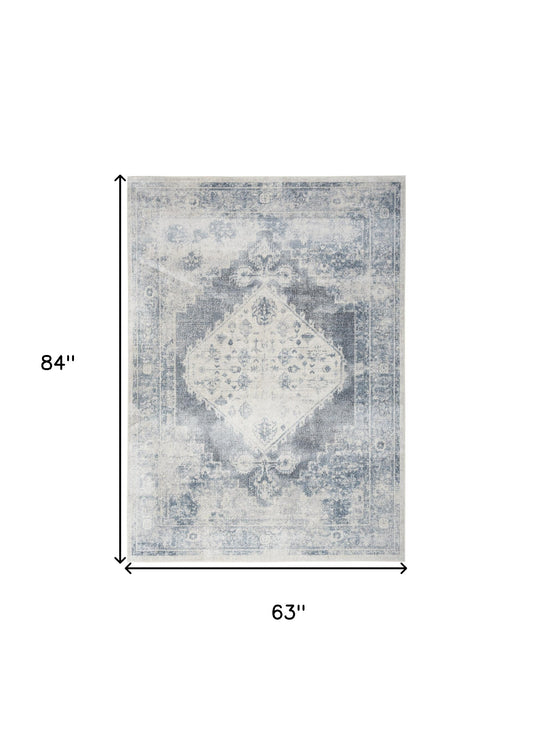 5' X 7' Blue Oriental Power Loom Distressed Washable Area Rug