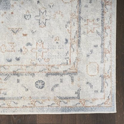 7' X 9' Light Blue Oriental Power Loom Distressed Washable Area Rug