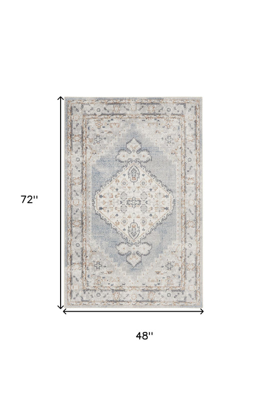 4' X 6' Light Blue Oriental Power Loom Distressed Washable Area Rug