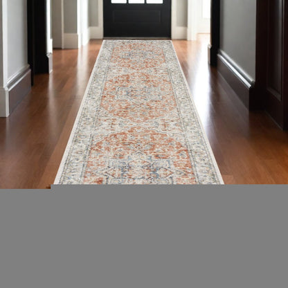 10' Gold and Ivory Oriental Power Loom Washable Runner Rug