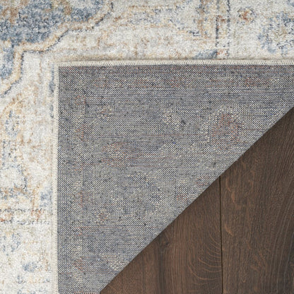 7' X 9' Denim Blue Oriental Power Loom Washable Area Rug