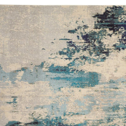 10' X 14' Ivory Abstract Power Loom Area Rug