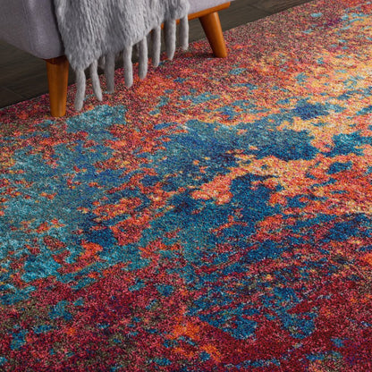7' X 10' Blue and Orange Abstract Power Loom Area Rug
