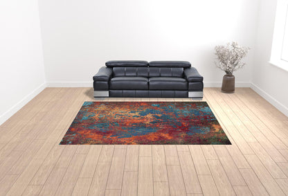 9' X 12' Blue and Orange Abstract Power Loom Area Rug