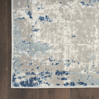 6' X 9' Ivory Abstract Power Loom Area Rug