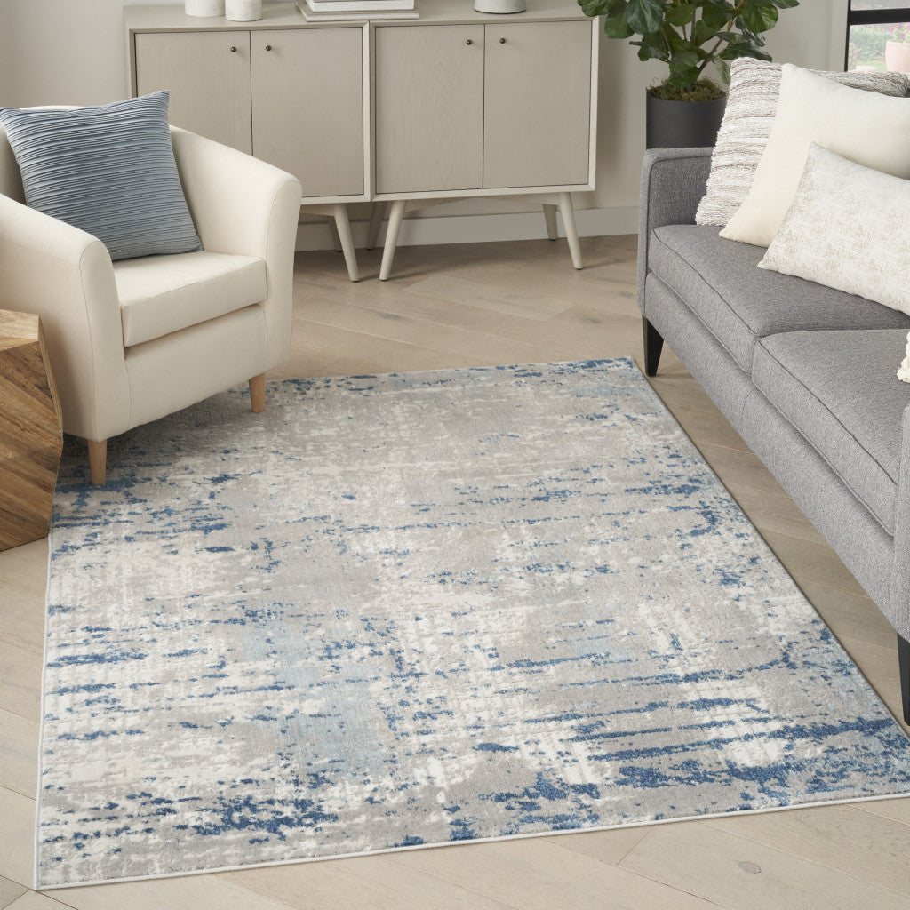 6' X 9' Ivory Abstract Power Loom Area Rug