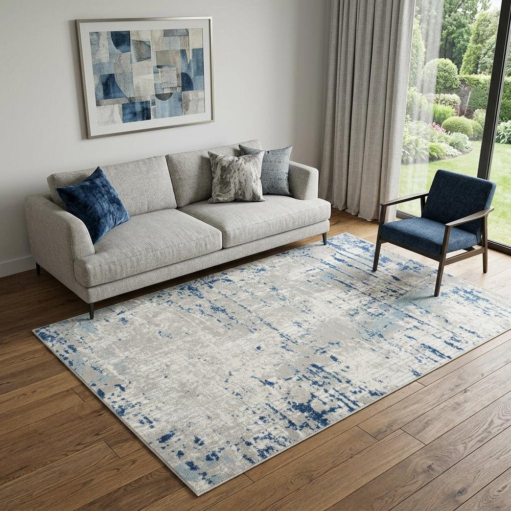 5' X 7' Ivory Abstract Power Loom Area Rug