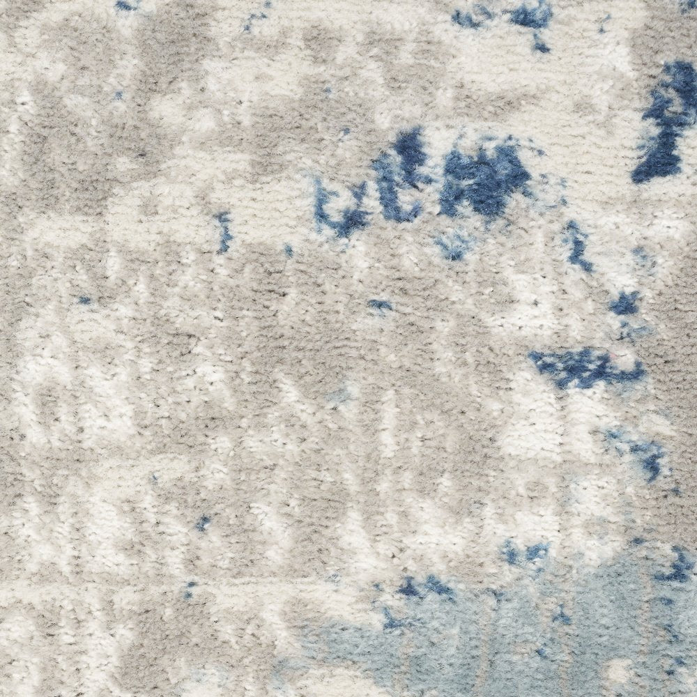 5' X 7' Ivory Abstract Power Loom Area Rug