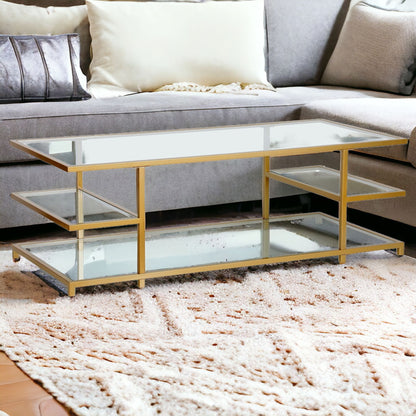 54" Gold Glass And Steel Coffee Table With Three Shelves