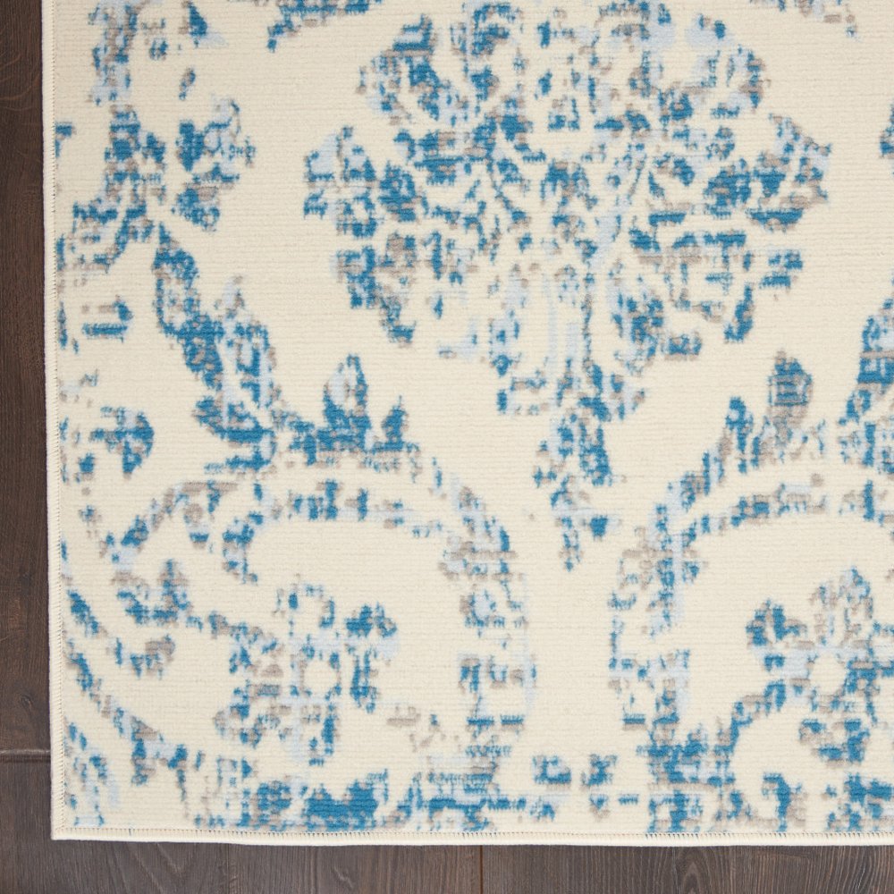 5' X 7' Ivory And Blue Damask Area Rug