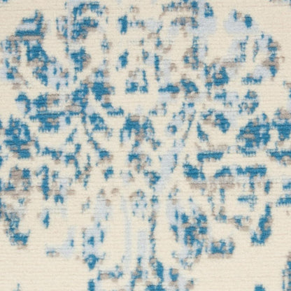 5' X 7' Ivory And Blue Damask Area Rug