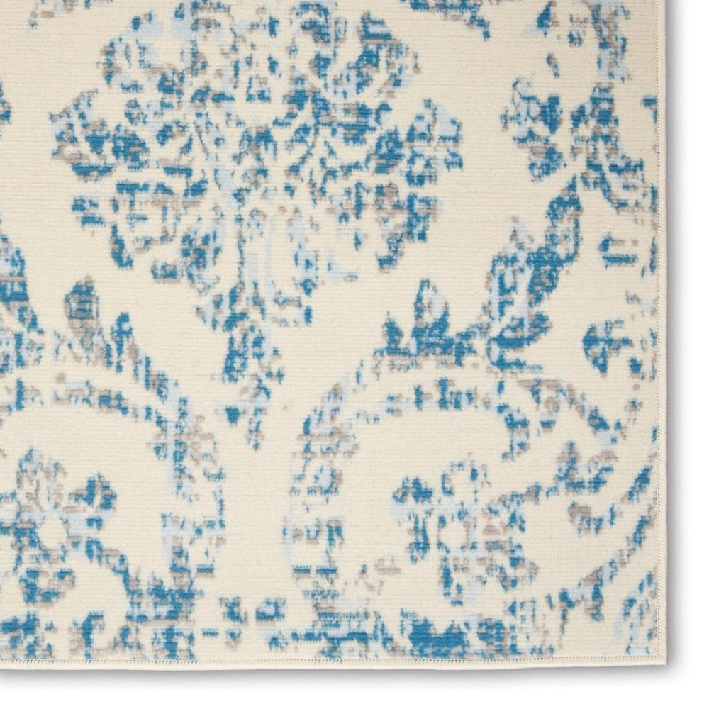 5' X 7' Ivory And Blue Damask Area Rug