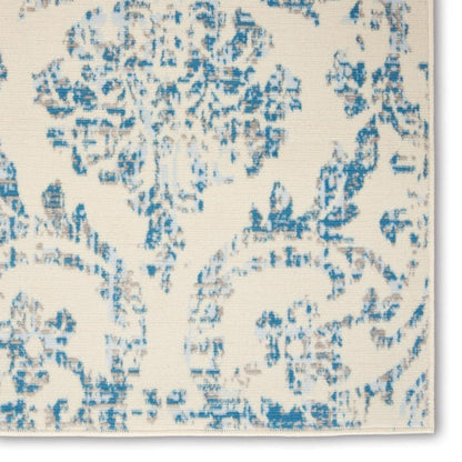 5' X 7' Ivory And Blue Damask Area Rug