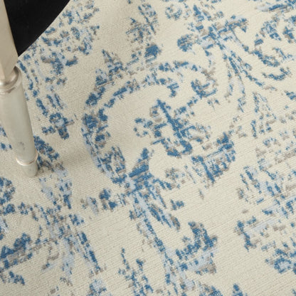 5' X 7' Ivory And Blue Damask Area Rug