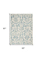 5' X 7' Ivory And Blue Damask Area Rug