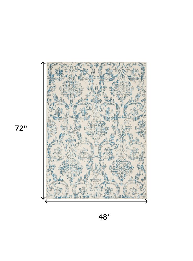 4' X 6' Ivory And Blue Damask Area Rug