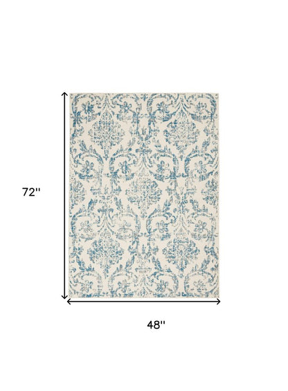 4' X 6' Ivory And Blue Damask Area Rug