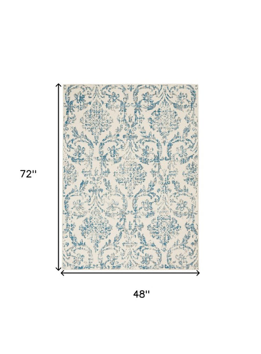 4' X 6' Ivory And Blue Damask Area Rug