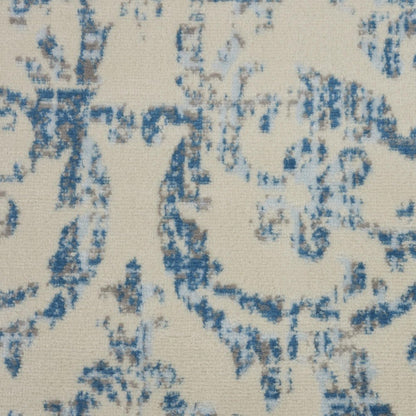8' X 10' Ivory And Blue Damask Area Rug