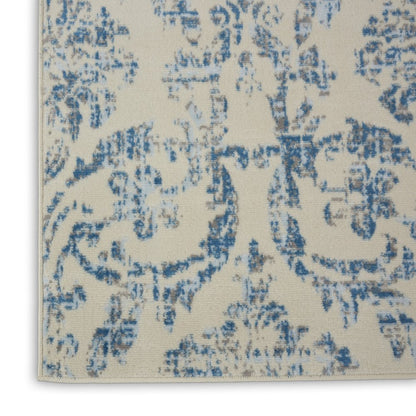 8' X 10' Ivory And Blue Damask Area Rug