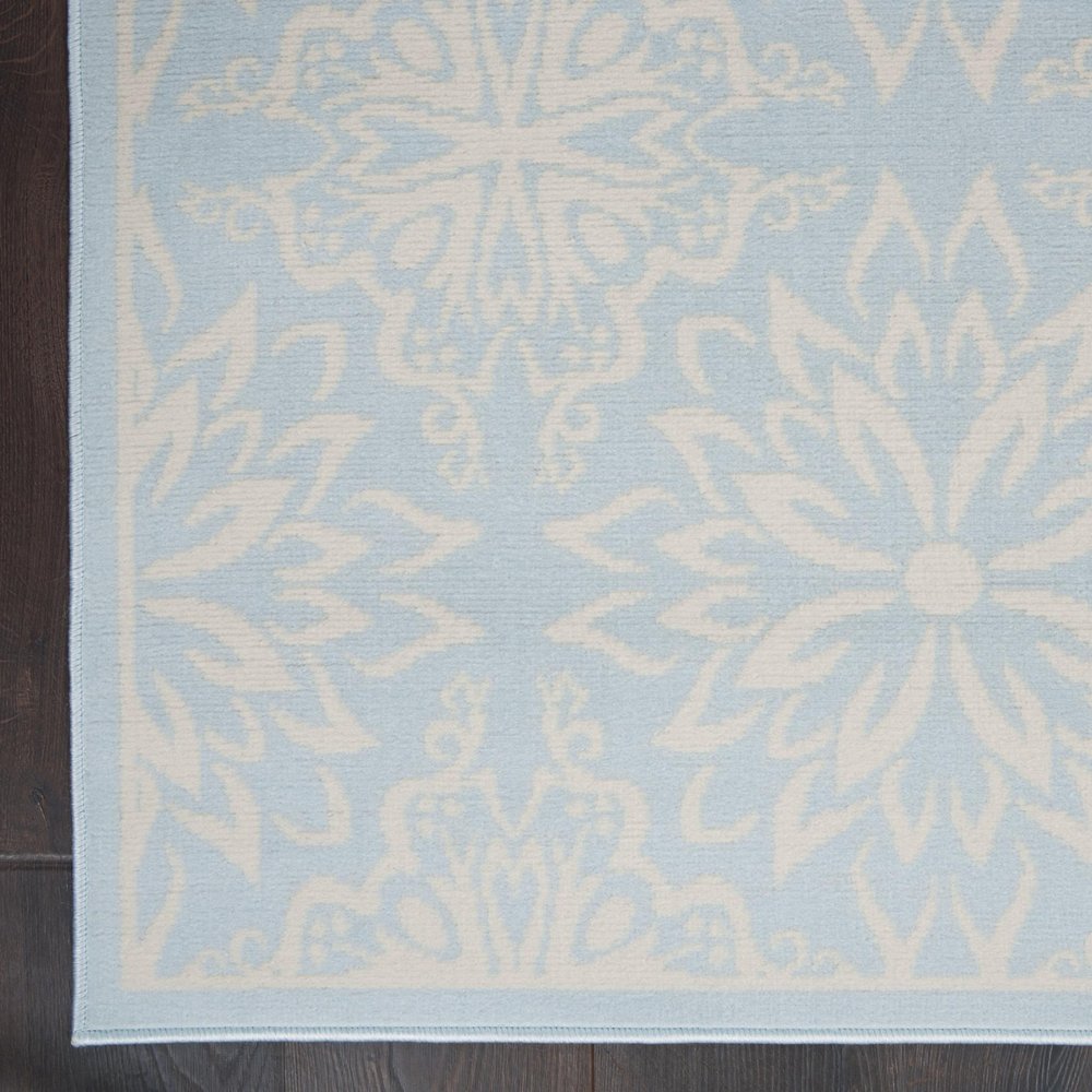 5' X 7' Light Blue Floral Power Loom Area Rug