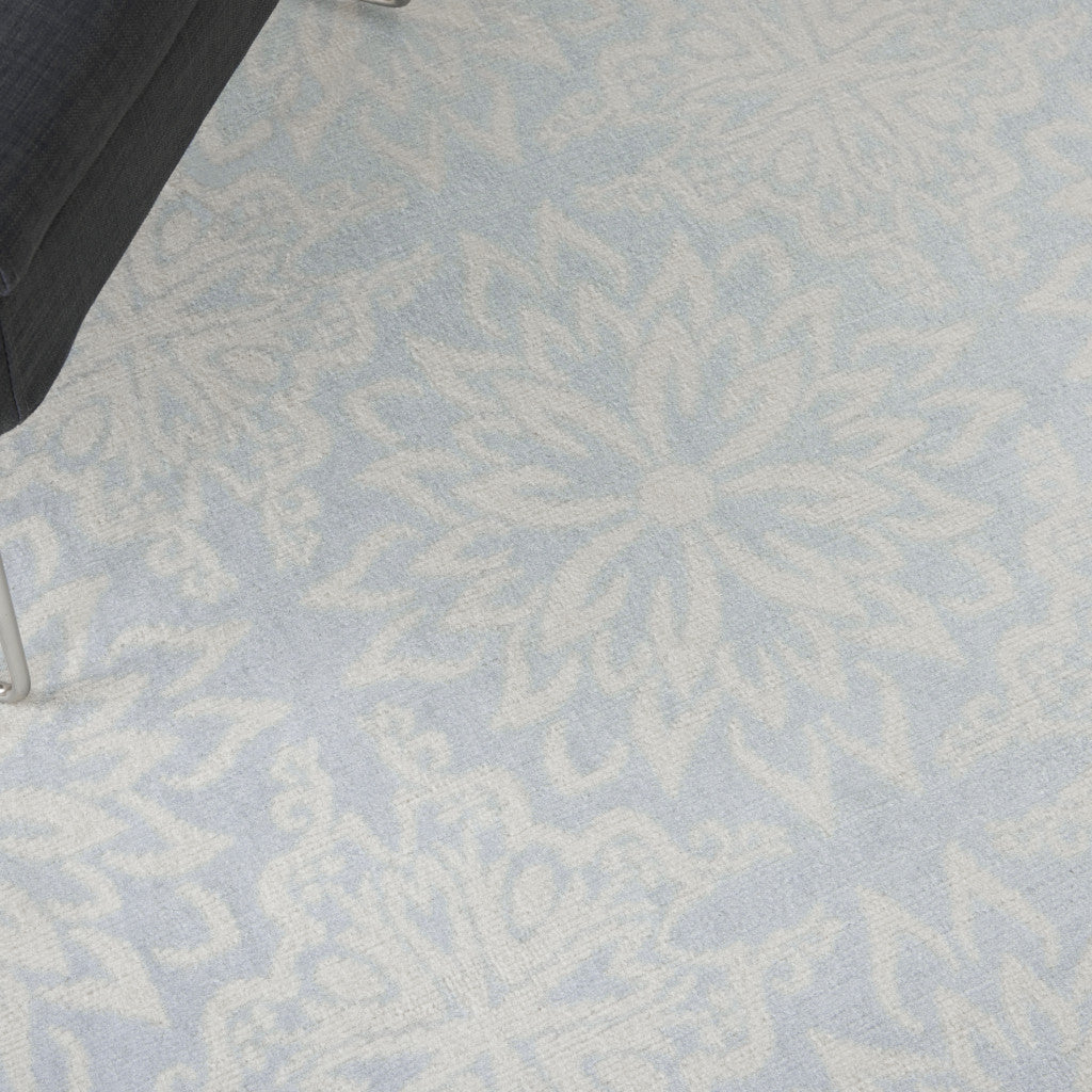 5' X 7' Light Blue Floral Power Loom Area Rug