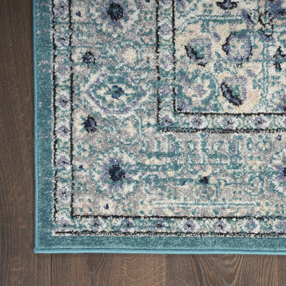 5' X 7' Aqua Floral Power Loom Distressed Area Rug