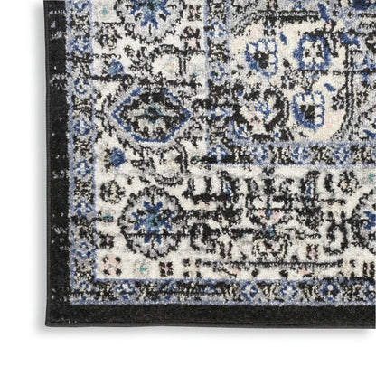 5' X 7' Black Floral Power Loom Distressed Area Rug