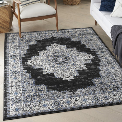 5' X 7' Black Floral Power Loom Distressed Area Rug