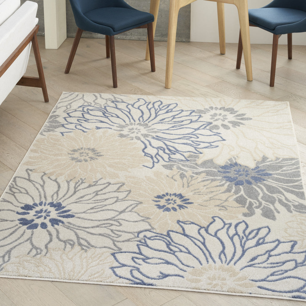 5' X 7' Cream Floral Power Loom Distressed Area Rug