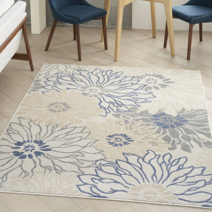 5' X 7' Cream Floral Power Loom Distressed Area Rug