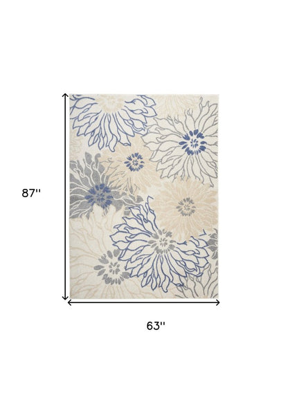 5' X 7' Cream Floral Power Loom Distressed Area Rug