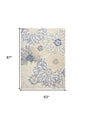 5' X 7' Cream Floral Power Loom Distressed Area Rug