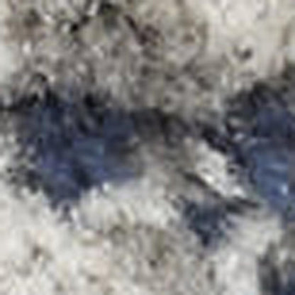 5' X 7' Cream Floral Power Loom Distressed Area Rug