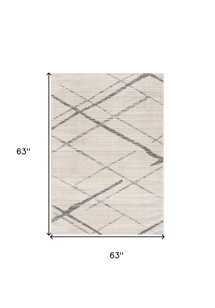 5' Beige and Gray Abstract Distressed Round Rug