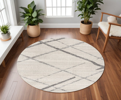 8' Beige and Gray Abstract Distressed Round Rug