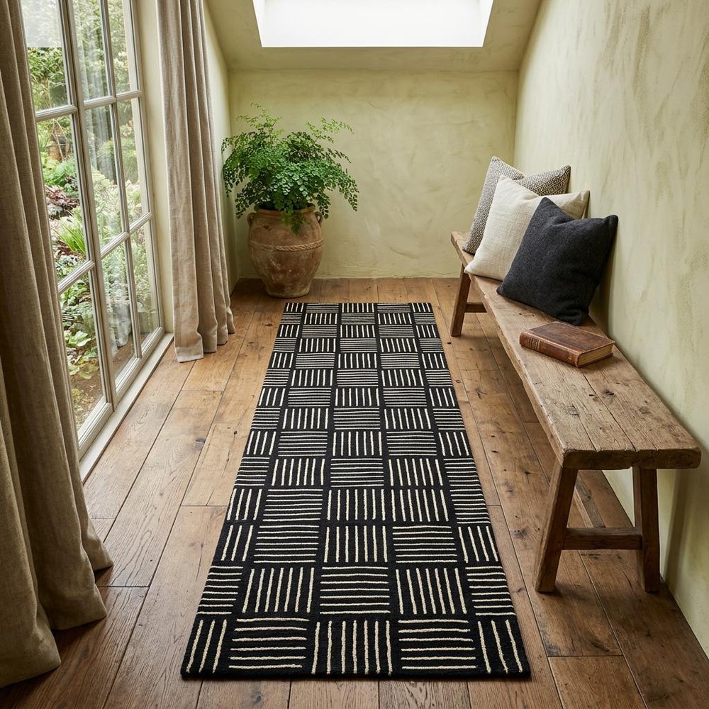 6' Black and Off White Abstract Machine Tufted Washable Runner Rug With UV Protection