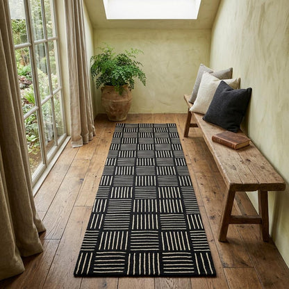 6' Black and Off White Abstract Machine Tufted Washable Runner Rug With UV Protection