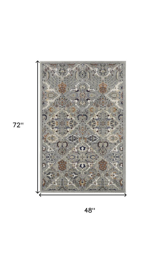 4' X 6' Green and Ivory Floral Power Loom Area Rug