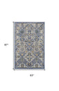 5' X 7' Green and Ivory Floral Power Loom Area Rug