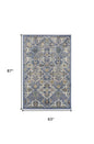 5' X 7' Green and Ivory Floral Power Loom Area Rug