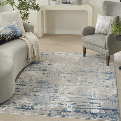 7' X 10' Blue and Gray Abstract Power Loom Area Rug