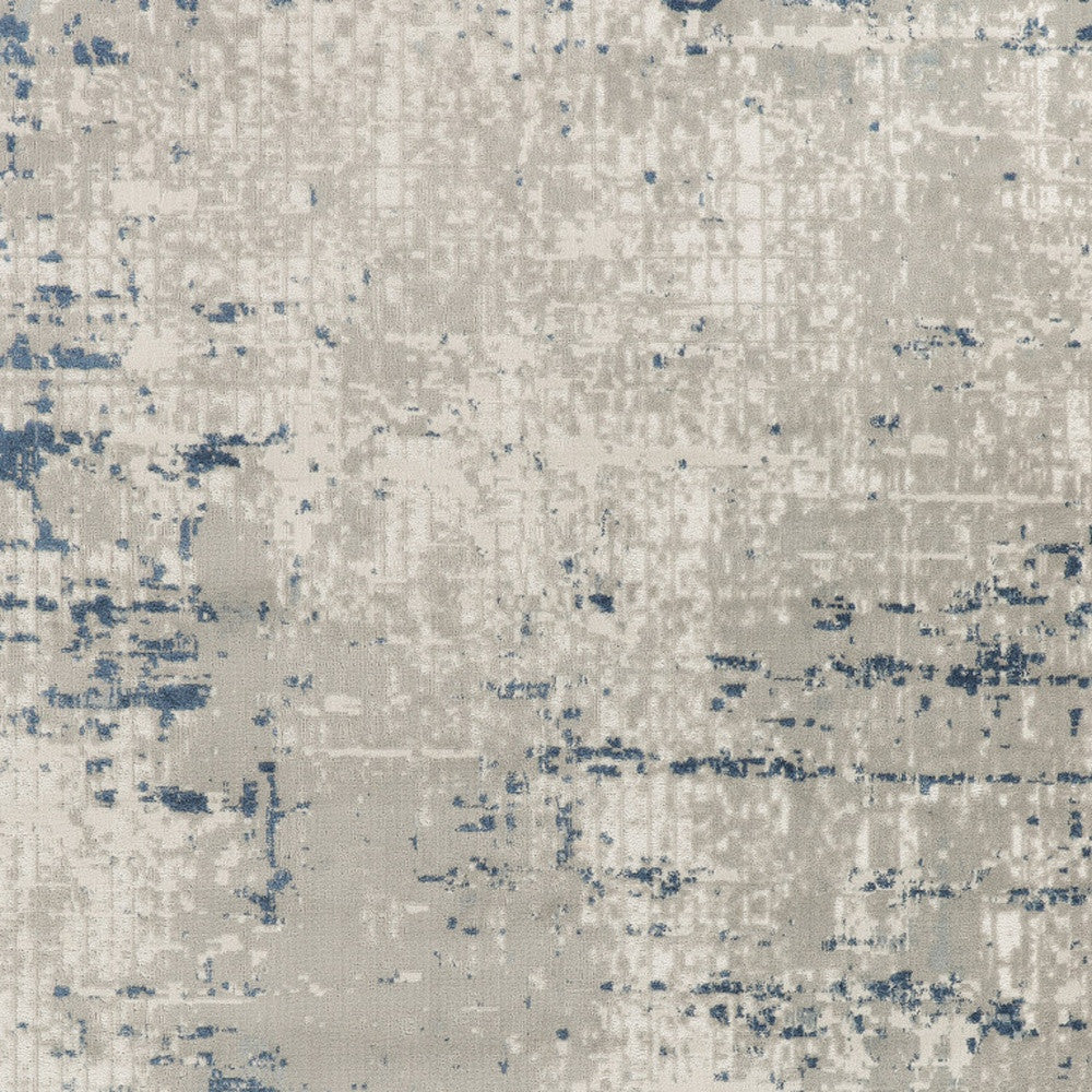 7' X 10' Blue and Gray Abstract Power Loom Area Rug