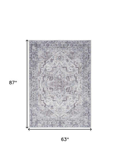 5' X 7' Blue And Pink Floral Power Loom Distressed Washable Area Rug