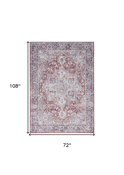 6' X 9' Blue And Pink Floral Power Loom Distressed Washable Area Rug