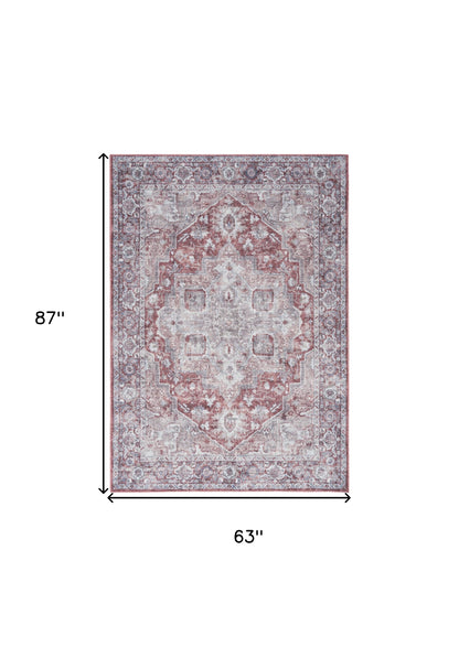 5' X 7' Blue And Pink Floral Power Loom Distressed Washable Area Rug