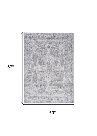 5' X 7' Blue And Pink Floral Power Loom Distressed Washable Area Rug