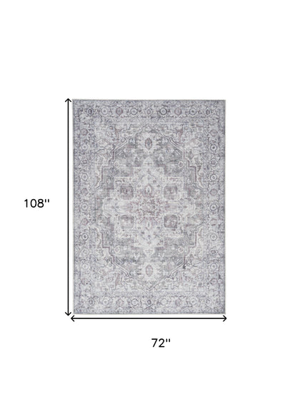 6' X 9' Blue And Pink Floral Power Loom Distressed Washable Area Rug