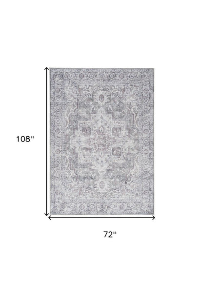 6' X 9' Blue And Pink Floral Power Loom Distressed Washable Area Rug